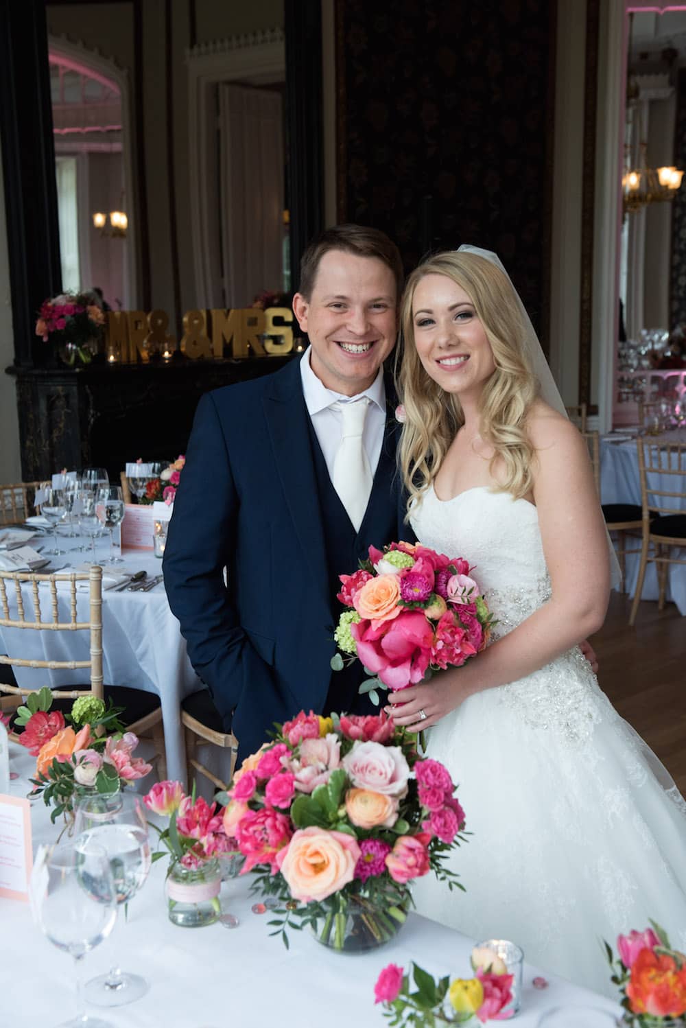 nonsuch mansion spring wedding, colourful table flowers