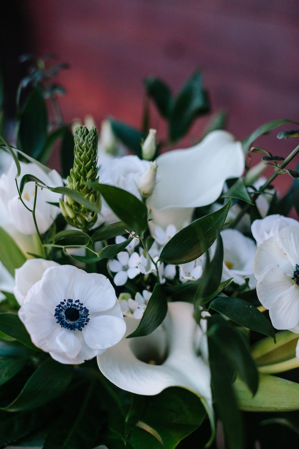 white anemones for stylish worthing wedding at Long furlong barn