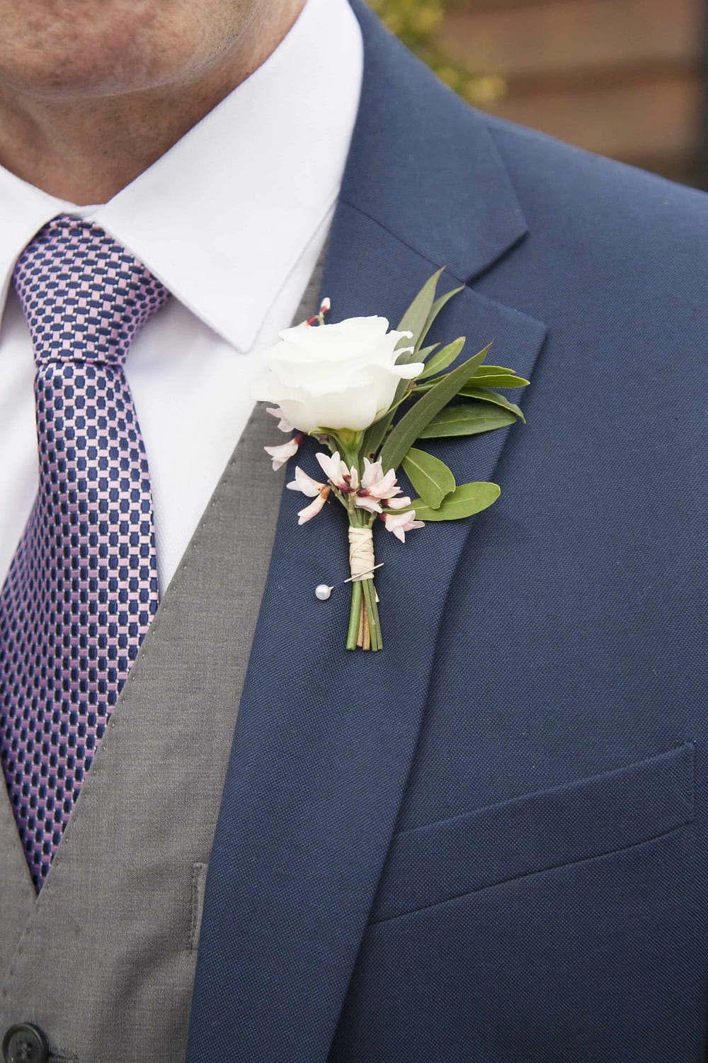 white lisianthus buttonhole, spring wedding ideas