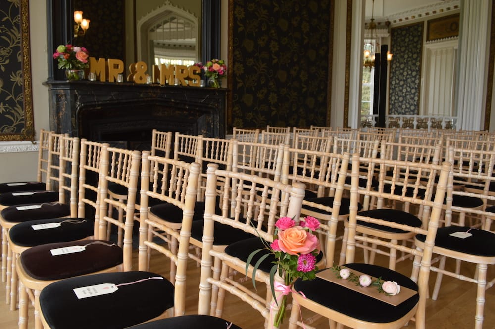 wedding ceremony at nonsuch mansion with flowers