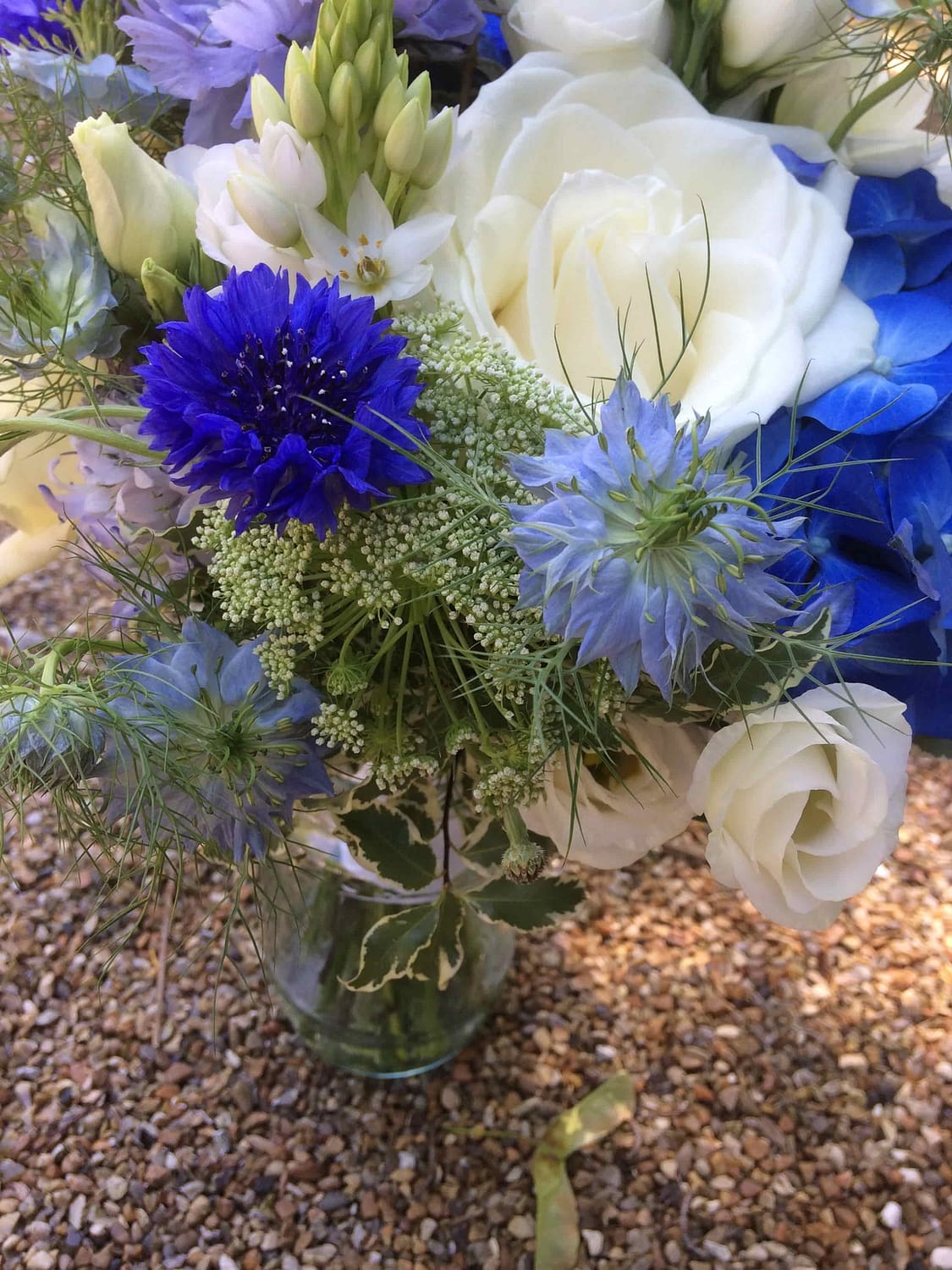 Blue and white bridesmaids bouquet at The English Wine Centre, East Sussex