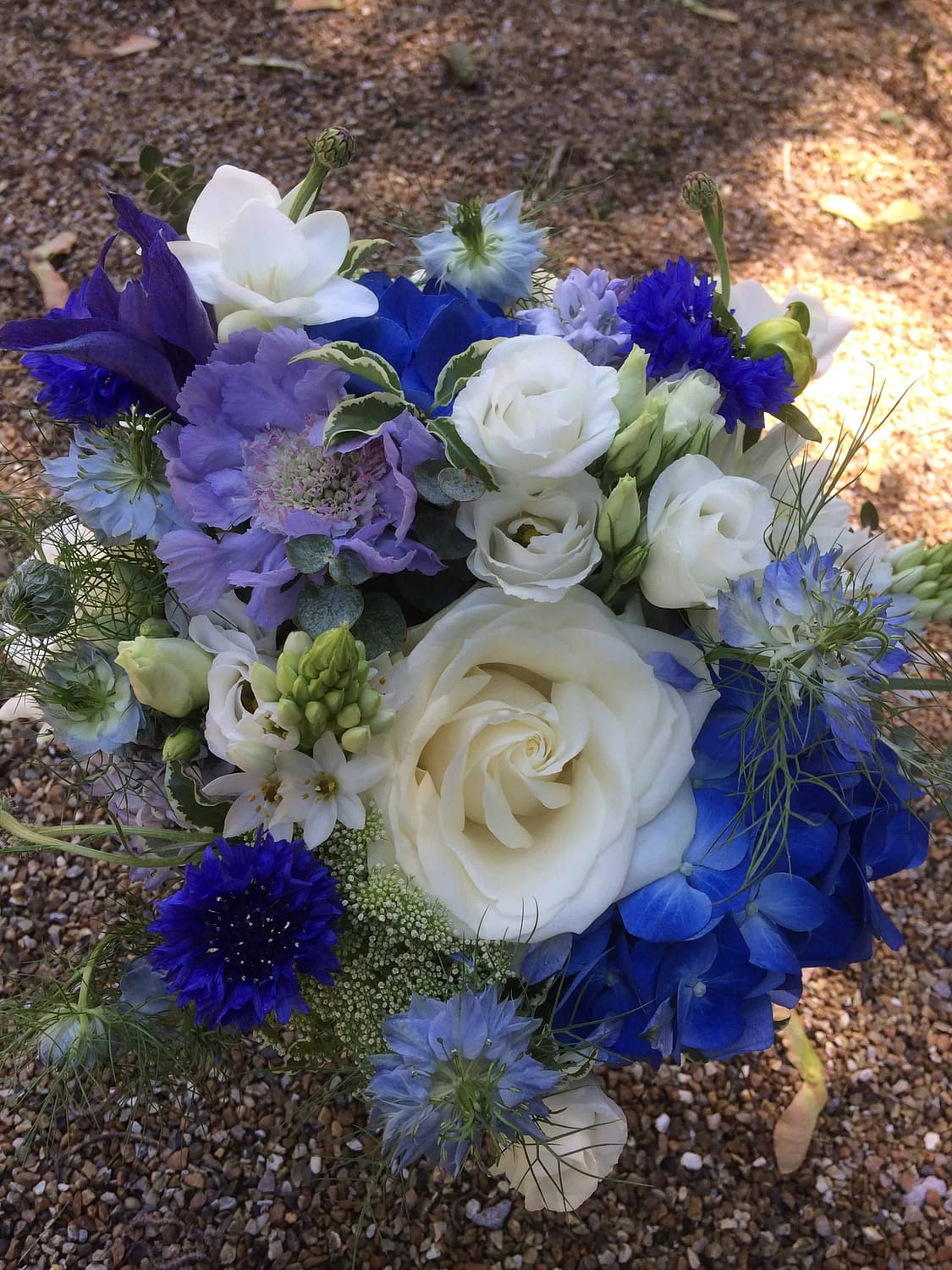 Blue and white summer bridal bouquet at The English Wine Centre, East Sussex