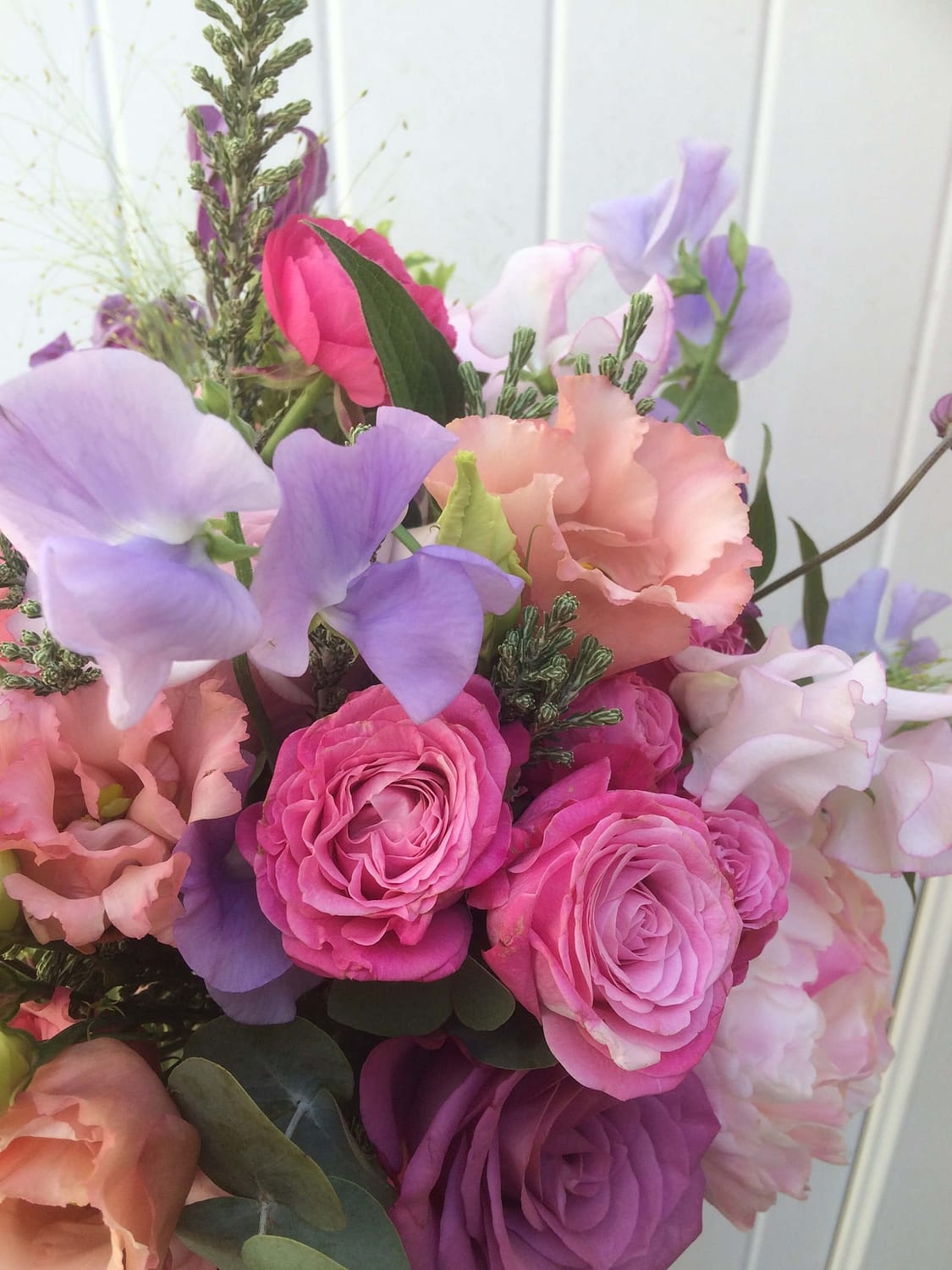 lilac sweet peas in bridal bouquet at Pangdean barn in Brighton