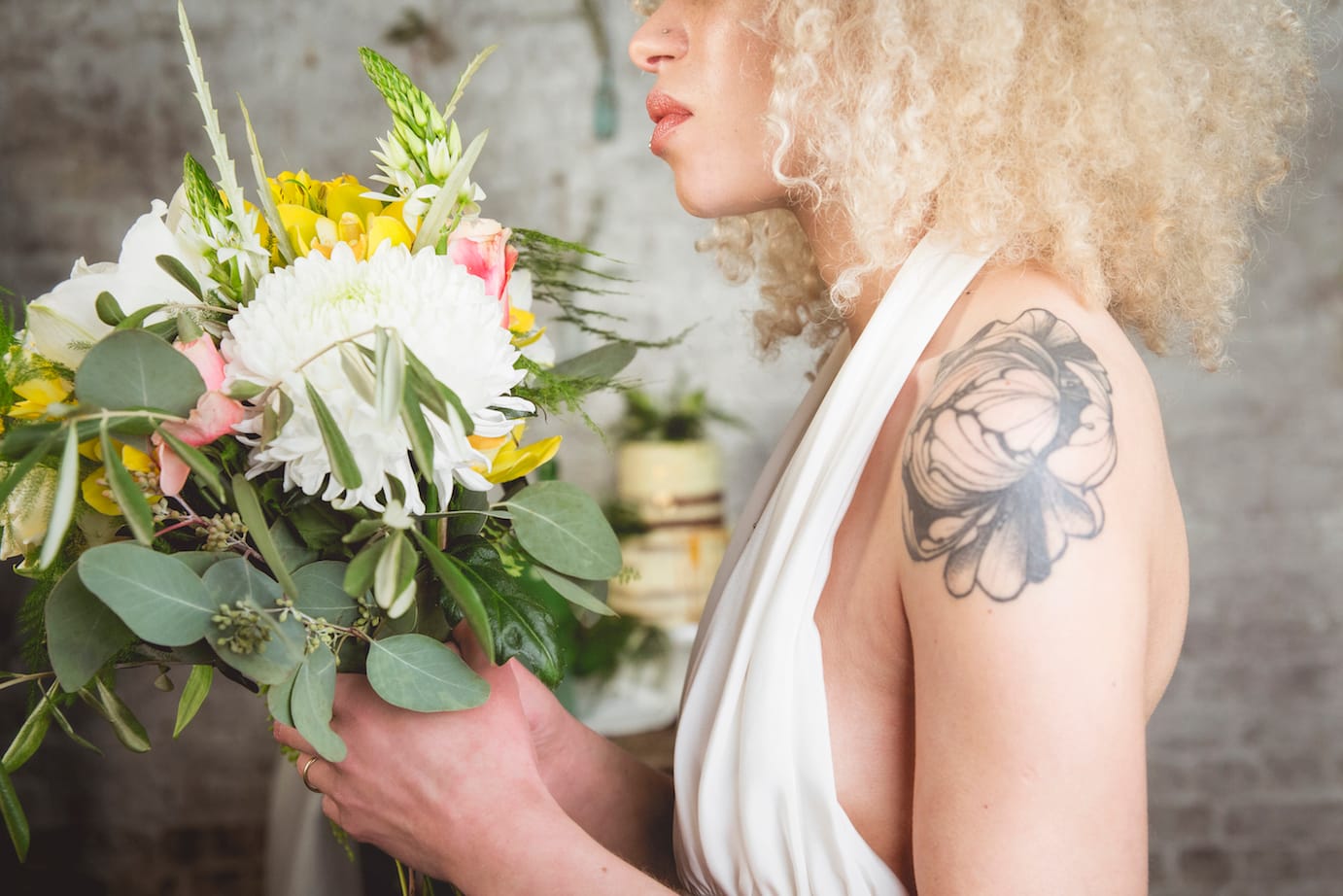 tattooed bride, blonde afro with flowers