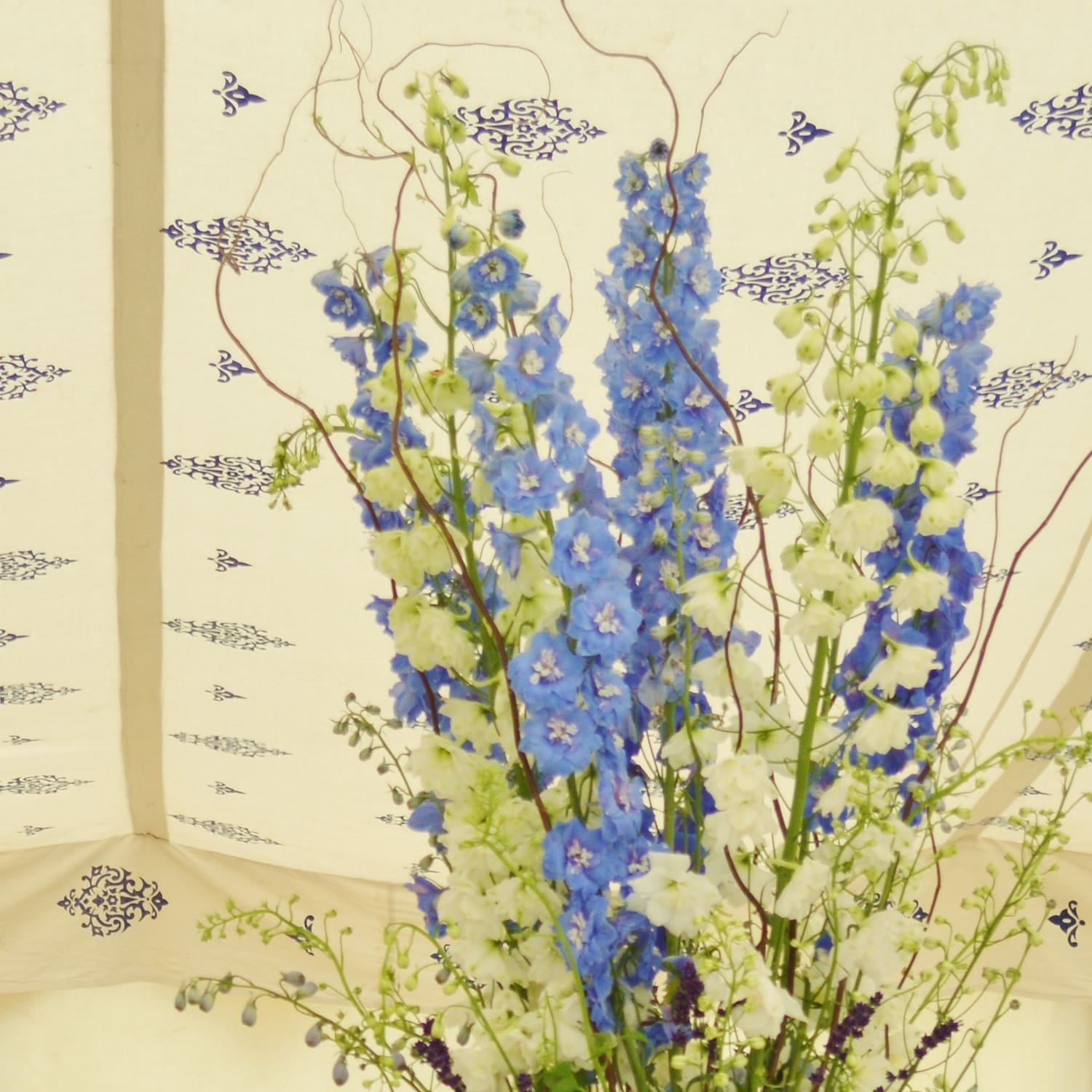 Blue wedding flowers, blue table arrangement, delphinium pedestal, blue urn arrangement, blue wedding