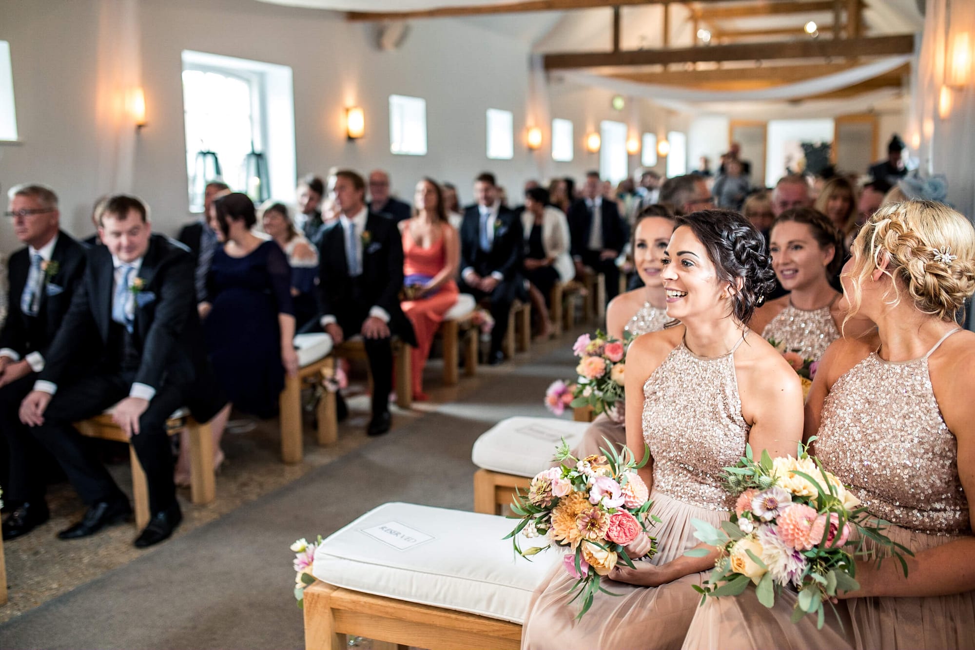 flowers down the aisle at southend barns