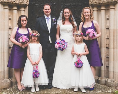 Bride and groom, bridesmaids and flower girls
