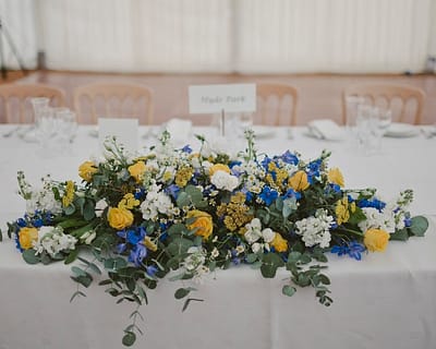 Table decoration with yellow flowers - Horsham