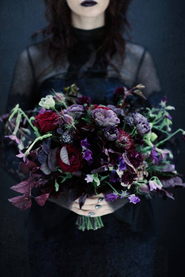 gothic bridal bouquet with dark purple and red flowers