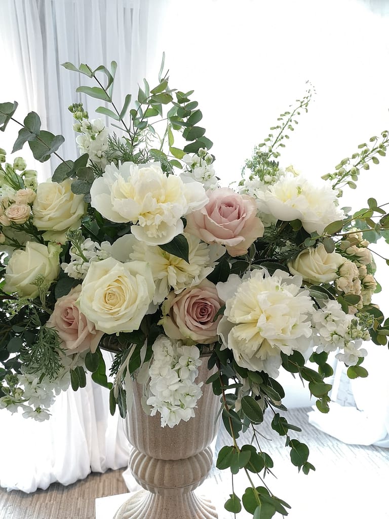 white and blush pink ceremony flowers at Alexander Hose