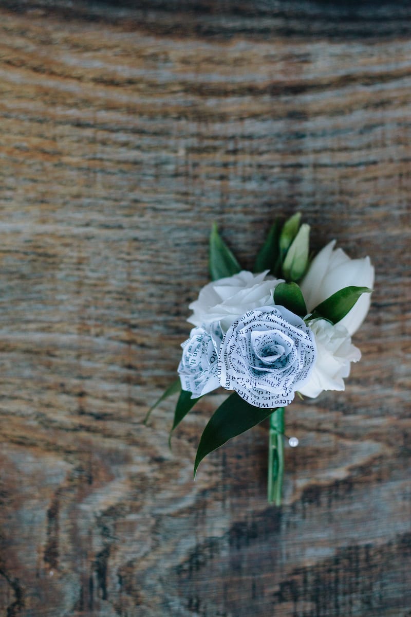 buttonholes with handmade paper roses and real flowers