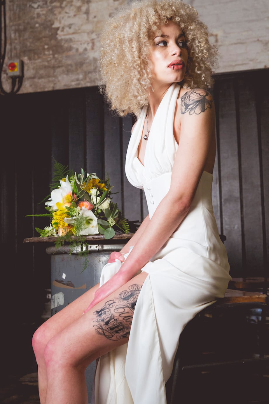 bridal jumpsuit with slit legs, tattoo bride