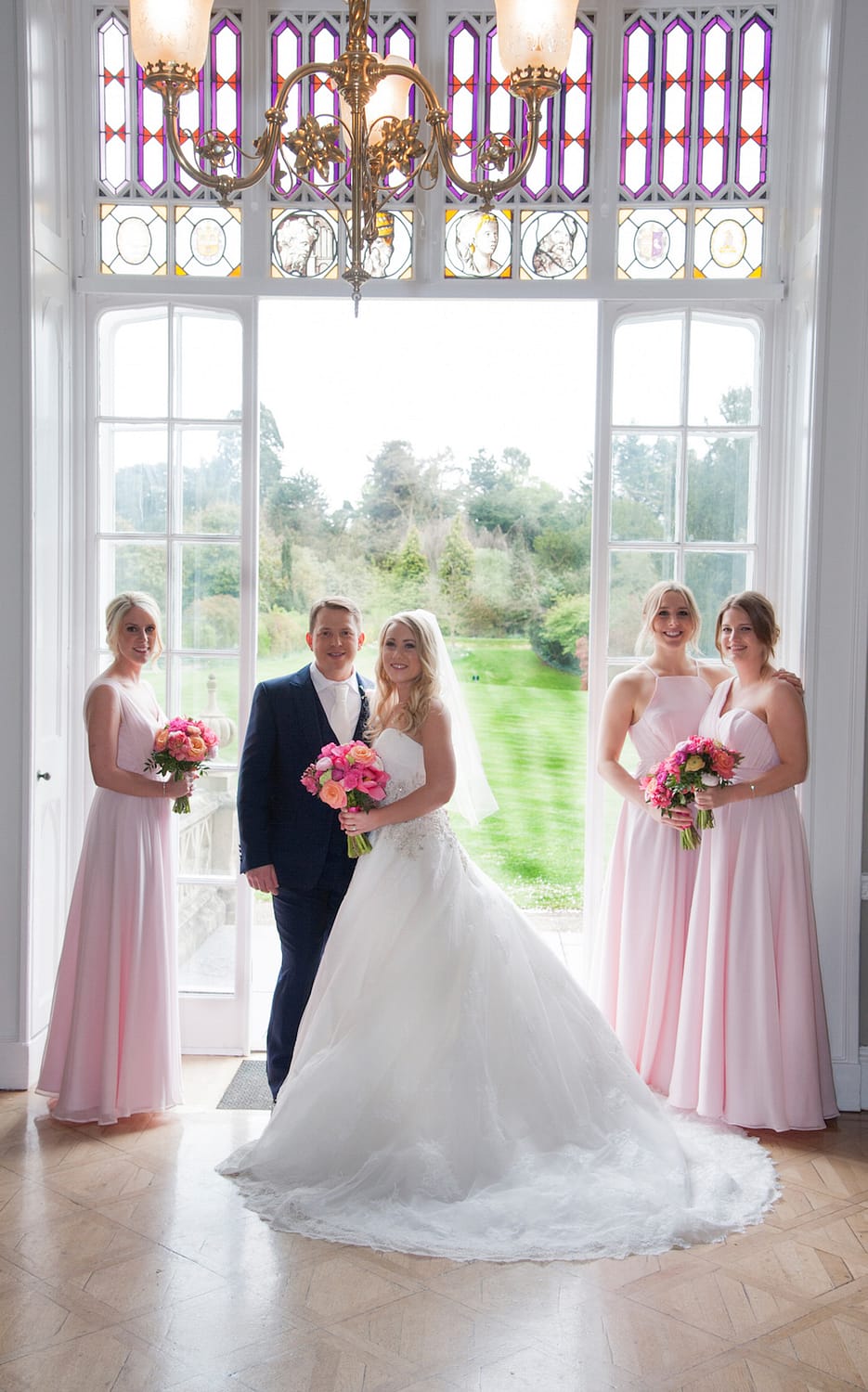 wedding party at nonsuch mansion, blush pink and coral colour scheme