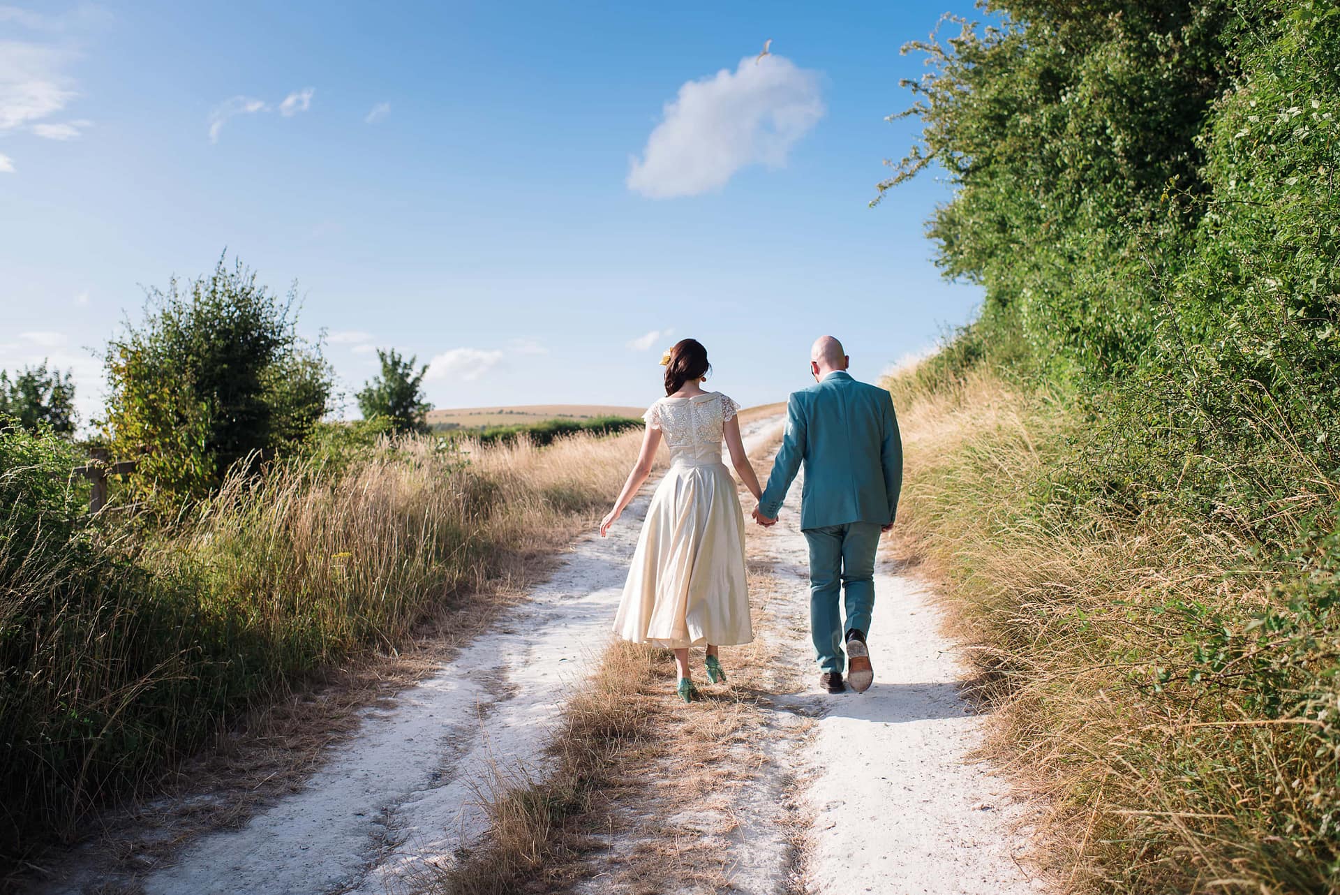 bride and groom in sussex countryside