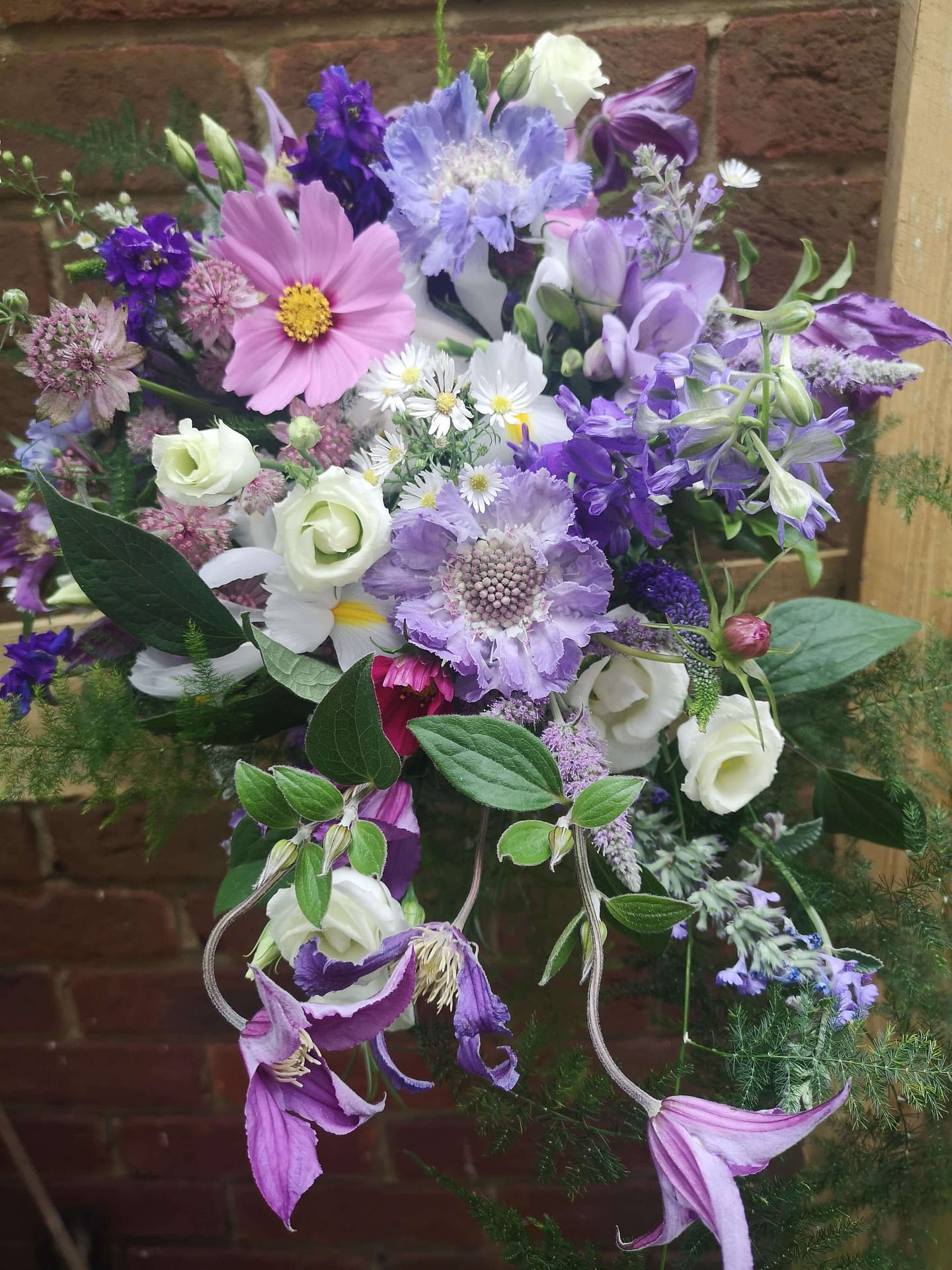 purple and lilac trailing bridal bouquet